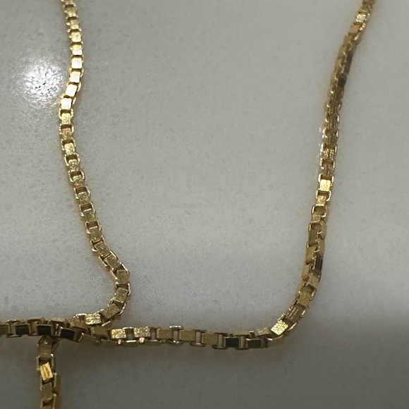 This is a yellow gold open heart diamond pendant necklace on a gold chain - Picture 7 of 8